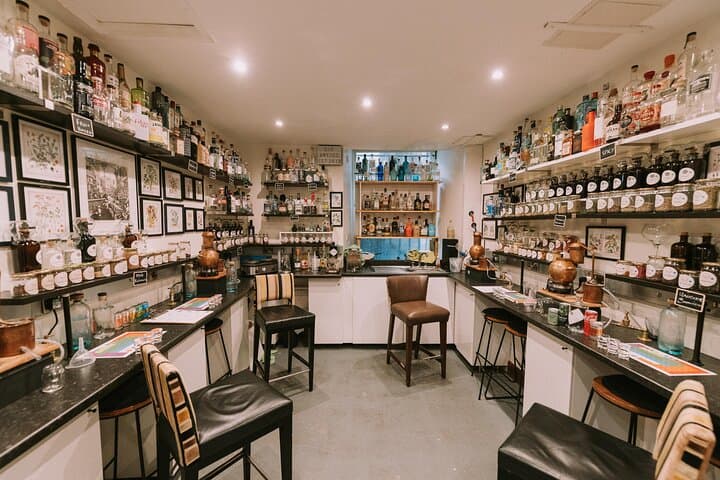 Distill a bottle of Gin on mini copper stills