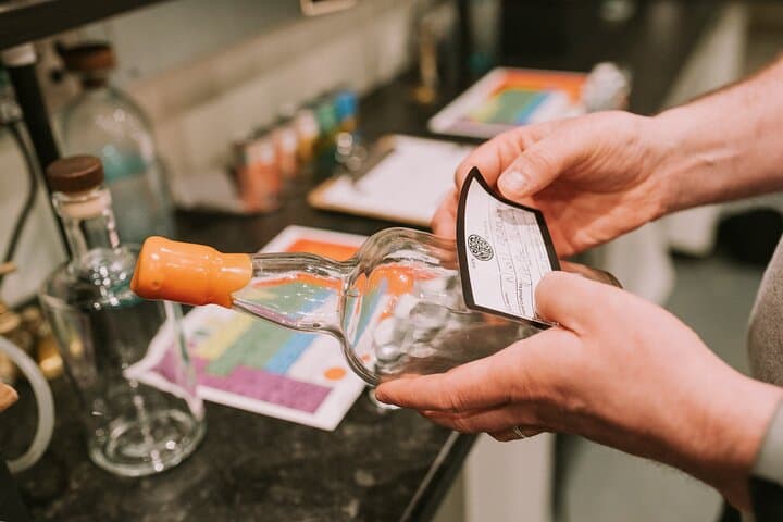 Distill a bottle of Gin on mini copper stills photo 2