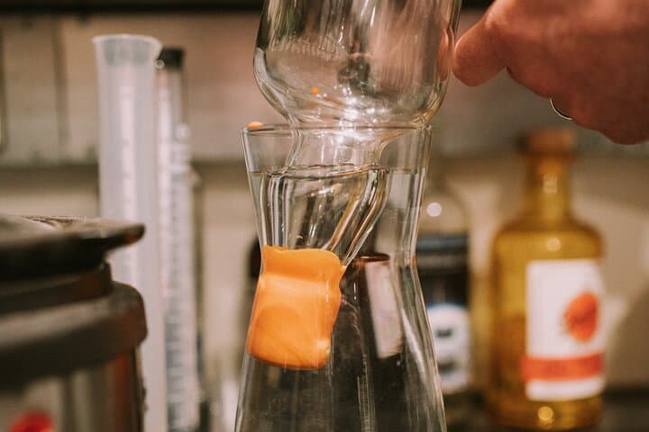 Distill a bottle of Gin on mini copper stills photo 4